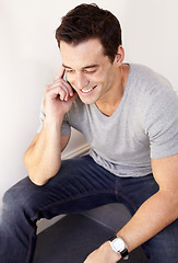 Image showing Man, smile and phone call in home for communication, social network and mobile contact on stairs of floor. Happy guy, relax and talking on smartphone for chat, conversation and hello for connection