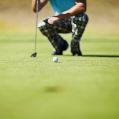 Image showing Sports, lawn and closeup of athlete with golf ball for competition, tournament or event. Fitness, grass and zoom of male player or golfer with equipment for game on an outdoor course or pitch.