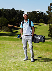 Image showing Smile, sports and portrait of male golfer with positive, good and confident attitude on field. Happy, fitness and African man athlete with equipment on an outdoor course for tournament or competition