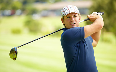 Image showing Sports, swing and man on golf course with club for playing game, practice and training for competition. Professional golfer, grass and person with golfing driver for winning with hit, stroke or score