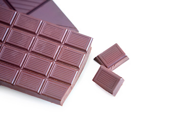 Image showing Milk chocolate, studio candy and cacao sweets for delicious swiss bar, wellness and dark cocoa grid slab, tasty dessert or snack. Junk food, sugar treat and luxury premium product on white background