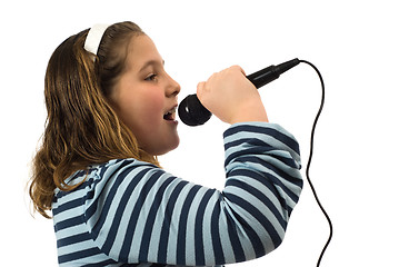 Image showing Child Singing In Microphone