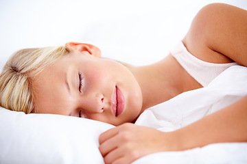 Image showing Bedroom, woman and sleeping with peace, tired and home with comfort, pillow and resting while dreaming. Mockup space, fatigue and exhausted person, taking a nap with a comfortable blanket and relax