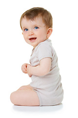 Image showing Joy, youth and happy with baby on floor of studio for cute, child development and learning. Explore, smile and young with infant crawling in white background for toddler, innocence and health