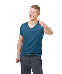Image showing Hands, portrait and happy man with thumbs up in studio for feedback, vote or agreement on white background. Face, smile and male model with emoji for review, support or thank you, success or gesture