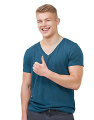 Image showing Portrait, happy and man with thumbs up in studio for feedback, vote or agreement on white background. Face, smile and male model with hand emoji for review, support or thank you, success or gesture