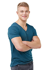 Image showing Man, fashion and arms crossed with denim jeans, happy and isolated on white studio background. Portrait, confident and adolescent for cool clothes, youth and smile with face, boy and casual