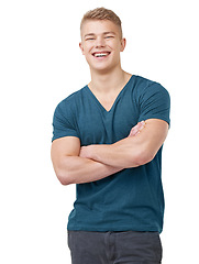 Image showing Fashion, portrait and happy man with arms crossed in studio confident, laugh or positive attitude on white background. Face, smile and male model with cool, clothes or streetwear, style or good mood