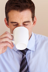 Image showing Coffee cup, face and business man drink hot chocolate, warm cacao liquid or morning wellness beverage. Eyes closed, espresso and relax corporate person with latte, cappuccino or matcha green tea mug