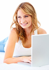 Image showing Woman, laptop and thinking in studio white background for online connection, floor or study email. Female person, model and smile on ground for digital learning or social media, research tech on web