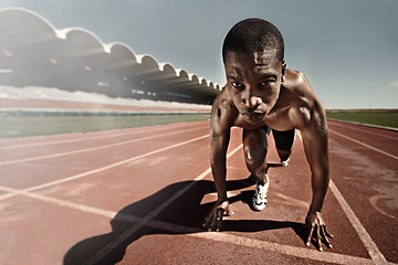 Image showing Man, runner and starting line for race, face and ready for marathon, sports and sprint or competition. Black male person, training and exercising or active, practice and outdoors for fitness on track