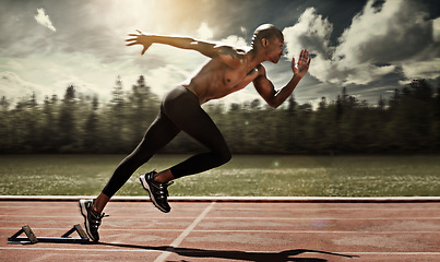 Image showing Man, runner and starting line for sprint, cardio and ready for marathon, track and race or competition. Black male person, training and exercising or speed, practice and athlete or fitness for body
