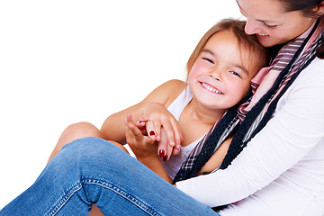 Image showing Mother, daughter and hug with happiness in studio for bonding, love and relax with peace or security. Family, woman and girl child with embrace, smile and care for parenting or relationship on mockup