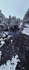 Image showing Amazing Cinematic Aerial View On Freezing River. Aerial View Flight Above Frozen Creek Scenic View Of Nature