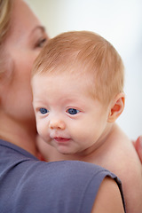 Image showing Family, shoulder and mom with baby in home for bonding, loving relationship and affection. Love, bedroom and closeup of mother carrying newborn for child development, growth and care in nursery