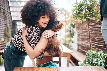 Image showing Friends, hug and happy for reunion, women and love or excited for meeting, fun and union at restaurant. People, embrace and solidarity or connection, support and greeting at cafe, smile and joy