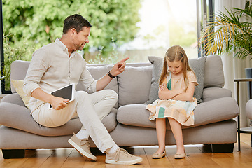 Image showing Parent, child and tablet with discipline on a sofa in the living room for naughty behavior at home. Upset, angry and young strict dad talking to sad girl kid on the couch in lounge at modern house.