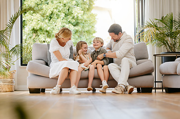 Image showing Family, tickle and play on couch, laughing and bonding at home, fun and silly humor or comedy. Parents and children, connection and security in relationship, happy and care on sofa, love and goofy