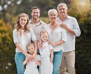 Image showing Portrait of big family in park together with smile, grandparents and parents with kids in backyard. Nature, happiness and men, women and children in garden with love, support and outdoor bonding.