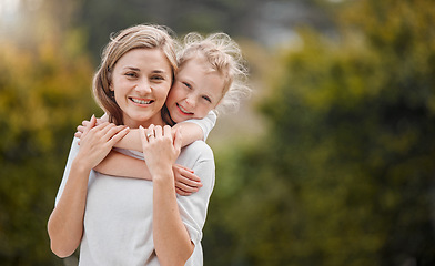 Image showing Nature, hugging and portrait of child with mother in an outdoor garden bonding together. Happy, smile and girl kid embracing her young mom from Canada with love and care in the park or field.