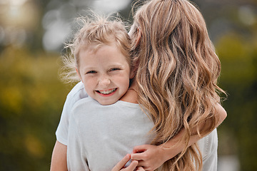 Image showing Nature, embracing and portrait of child with mother in an outdoor garden bonding together. Happy, smile and girl kid hugging her young mom from Canada with love and care in the park or field.