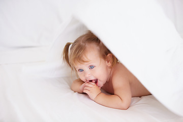 Image showing Home, growth and child development with a baby in the bedroom to relax alone in the morning. Happy, kids or youth and an adorable young infant girl on a bed with blankets for comfort in an apartment