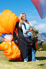 Image showing Parachute, sport or woman in nature for portrait, smile or strings for exercise for flight preparation. Athlete, face or happy with travel for outdoor wellness, helmet or equipment in countryside