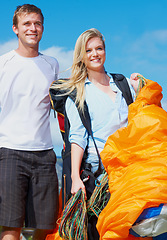Image showing Couple, parachute or people in nature for sport, smile or paragliding equipment for exercise for wellness. Man, woman or training gear for outdoor fitness, adventure or safety harness in countryside