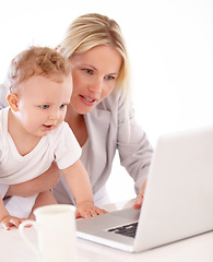 Image showing Businesswoman, baby and laptop for remote work in home for learning, playing or streaming on web. Mother, little boy and care for teaching, technology and skill for growth, development and milestone