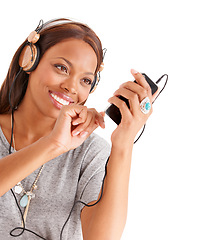 Image showing Happy black woman, phone and headphones for podcast or audio streaming against a white studio background. Face of African female person on mobile smartphone app for sound track, playlist or music