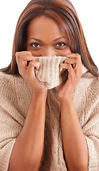Image showing Shy, black woman and sweater with portrait, funny and girl isolated on a white studio background. Face, African person and model with winter clothing, cover and playful with emotion, goofy and silly