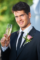 Image showing Happy man, portrait and glass of champagne at wedding of groom in toast, celebration or speech at outdoor ceremony. Face of handsome, attractive or married male person with alcohol or sparkling drink