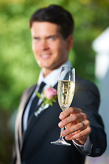 Image showing Wedding, toast and groom with glass of champagne for romantic celebration, party or event. Cheers, alcohol and young man in a suit with sparkling wine at luxury, elegant and fancy marriage ceremony.