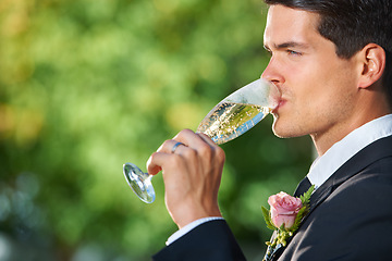 Image showing Wedding, nature and groom drinking champagne for romantic celebration, party or event. Garden, alcohol and young man in a suit with sparkling wine at luxury, elegant and fancy marriage ceremony.