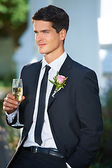 Image showing Smile, wedding and young groom with champagne in suit with a flower for a classy, elegant and luxury event. Happy, handsome and man from Canada with wine at marriage ceremony or party for commitment.