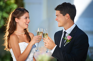 Image showing Happy couple, wedding and cheers with champagne glasses in celebration for marriage, love or commitment. Married man and woman smile with alcohol for toast, date or honeymoon at outdoor ceremony