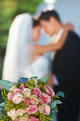 Image showing Flower, bouquet and couple with hug at wedding for love, smile and commitment at garden reception. Roses, happy woman and man embrace at marriage celebration event, partnership or future together