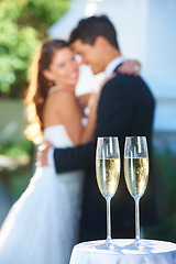 Image showing Drinks, champagne and happy couple in embrace at wedding with love, smile and commitment at reception. Wine glass, woman and man hugging at marriage celebration event, partnership and future together