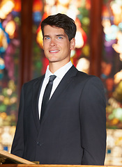 Image showing Groom, man and portrait with smile or waiting in church, stained glass or ceremony with classy suit. Marriage, person and face with happy for wedding, commitment or union with formal wear and joy