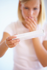 Image showing Anxiety, shock and woman with pregnancy test in bathroom waiting for results, news and surprise. Motherhood, pregnant and worried person with medical testing kit for fertility or ovulation at home