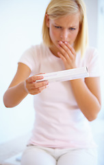 Image showing Anxiety, nervous and woman with pregnancy test in bathroom waiting for results, news and lines. Motherhood, pregnant and worried person with medical testing kit for fertility or ovulation at home