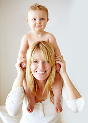 Image showing Portrait, mother and carrying baby on shoulders in house bedroom for fun, games and playing. Smile, happy and woman holding toddler in trust, support and love for development, growth and family home