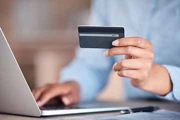 Image showing Business woman, laptop and hands with credit card for payment, online shopping or banking at office. Closeup of female person or employee with debit for fintech, purchase or ecommerce at workplace