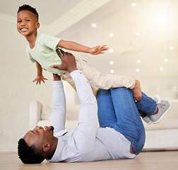Image showing Dad, child and airplane play on floor, fun and bonding in childhood, love and smile for freedom. Happy, father and son at home, flying and portrait or support, joy and excited for fantasy game