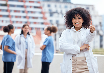 Image showing Thumbs up, portrait and doctor or woman in healthcare support, thank you or excellence for hospital services. African person with like, yes or okay hand or emoji for outdoor clinic success on rooftop