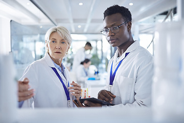 Image showing Student, medical and tablet with professor for research, disease analysis and collaboration in pharmacy. Man, senior woman and diversity for healthcare breakthrough, cure and vaccine in medicine vial