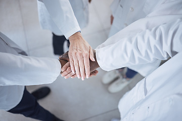 Image showing Hands, teamwork and doctors in the hospital for motivation or solidarity in medicine or healthcare. Medical, support or unity with a group of health professionals closeup in a clinic from above