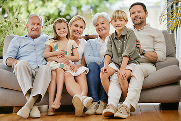 Image showing Smile, happy and portrait of big family on a sofa relaxing in the living room of modern house. Bonding, love and young children together, resting and sitting with grandparents and parents at home.