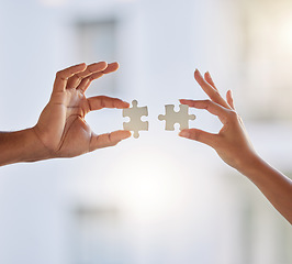 Image showing People, puzzle and hands of teamwork, problem solving and planning solution for challenge, synergy or cooperation. Closeup, collaboration and build jigsaw for integration, partnership or mockup space