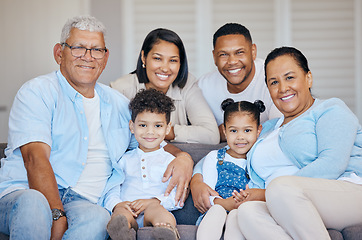 Image showing Portrait, home and family on a sofa, happiness and relax with weekend break, apartment and generations. Grandparents, mother or father with children, kids and rest with joy and cheerful in a lounge